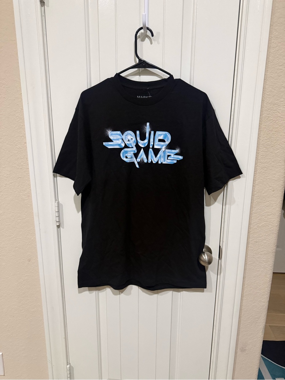 Black Short Sleeve Tee with Blue 'Squid Game' Graphic
